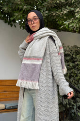 Stitchy Cardigan Gray crafted from trico fabric, featuring long sleeves for a cozy and stylish look.