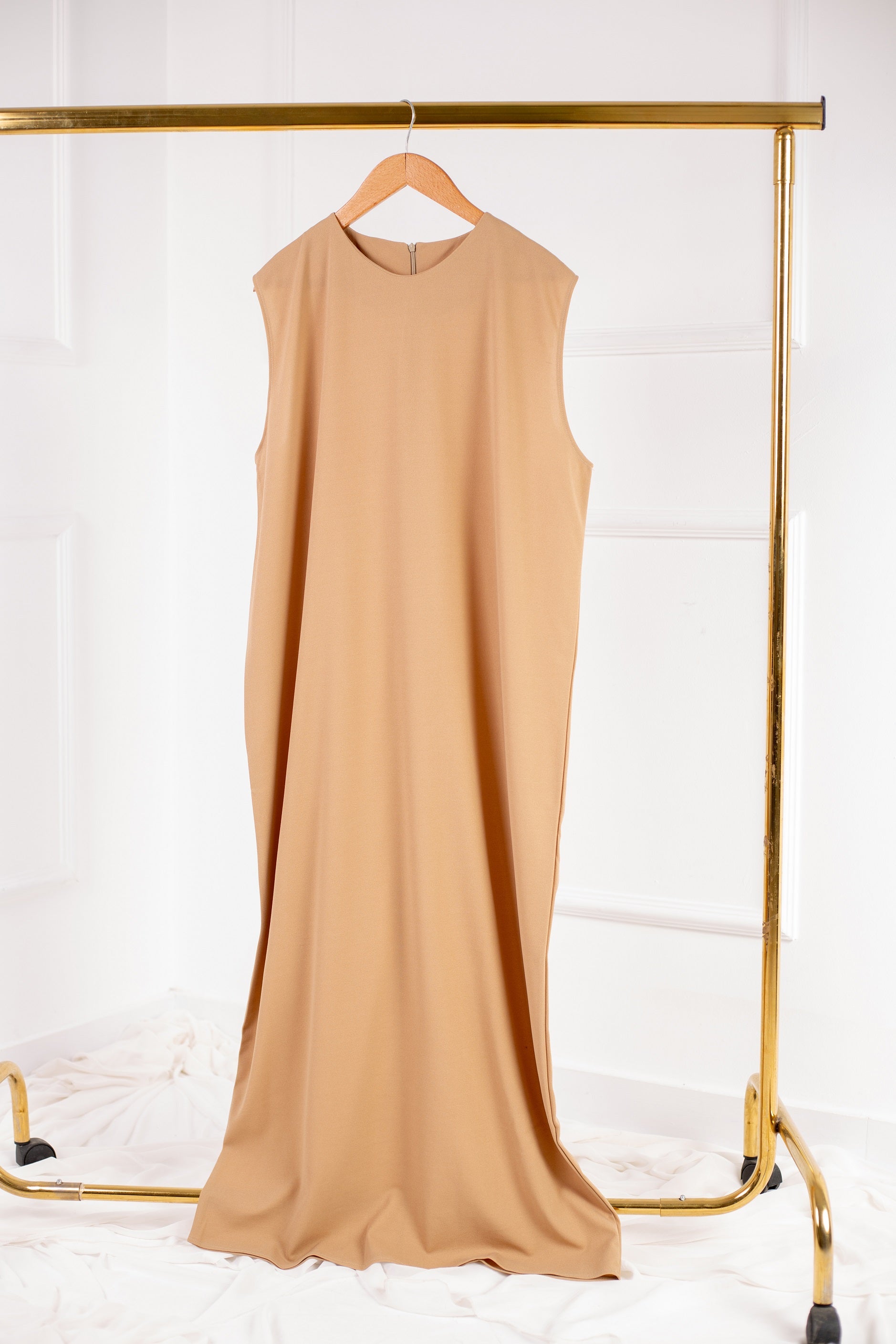 Beige basic Dress perfect for wearing under your favorite pieces.
