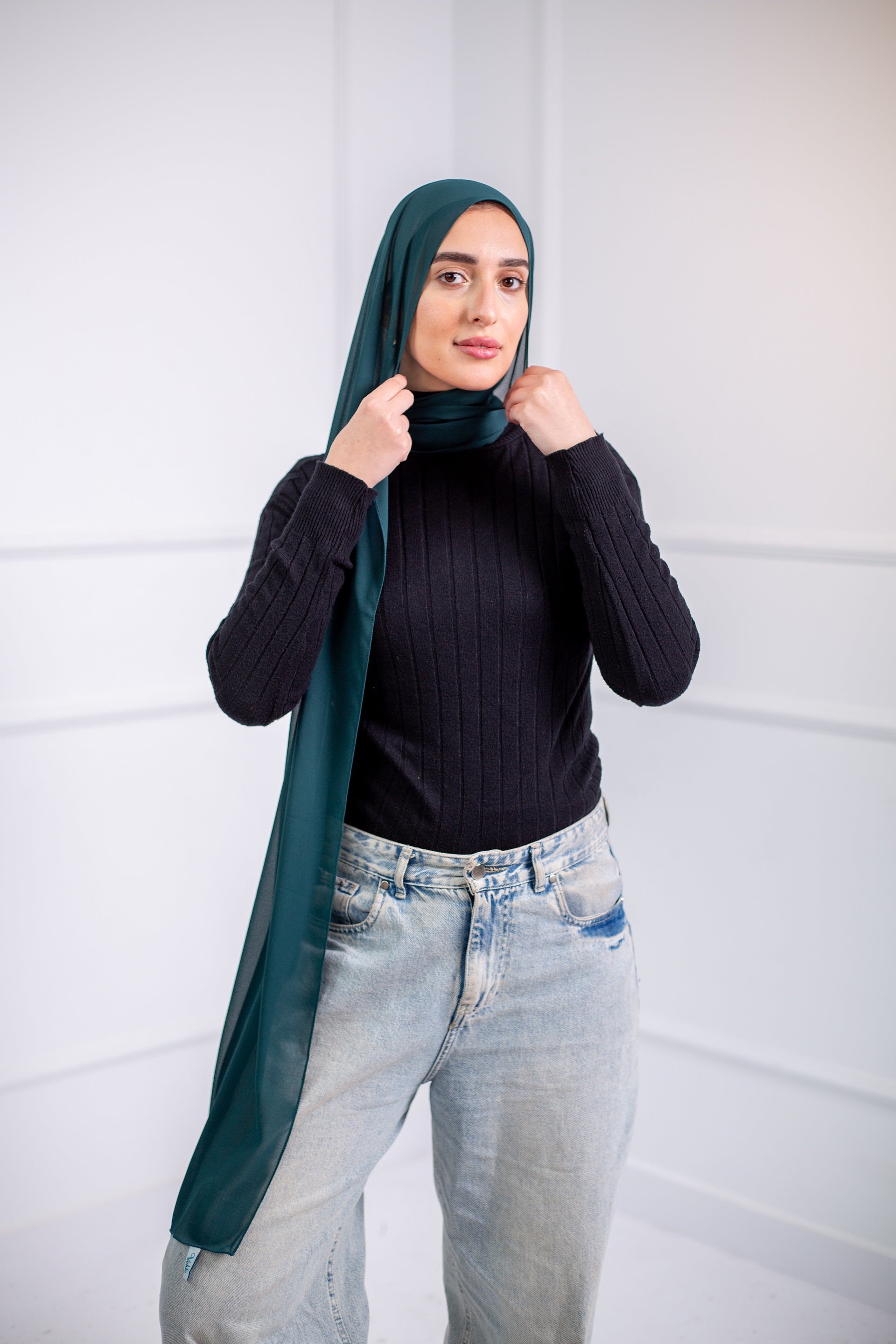 The chiffon scarf is a wardrobe essential, available in a variety of colors to suit your need