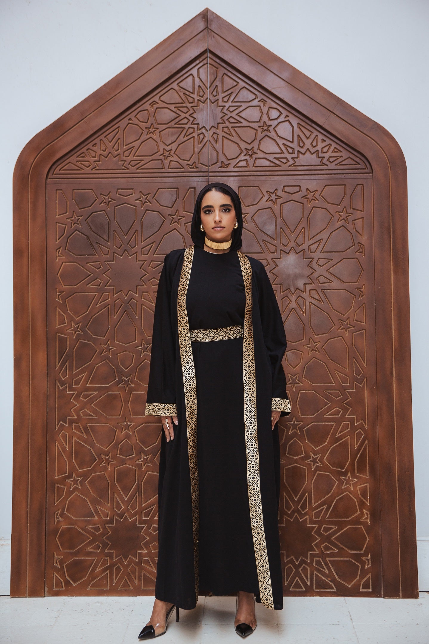 Horya Kaftan Black Crafted from scuba fabric, its flowing design drapes beautifully, while the belt adds definition, creating a timeless and feminine silhouette.