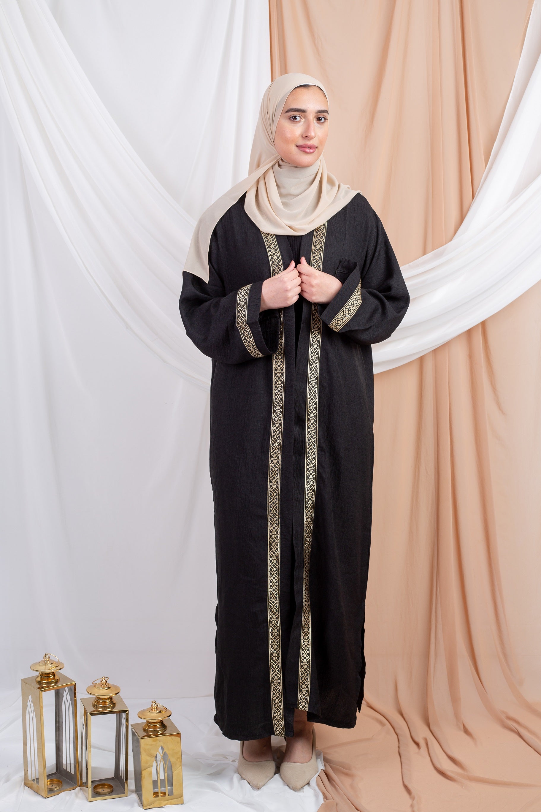 Hosn Kaftan Black is  linen fabric provides a sleek, polished look,allowing for effortless movement and timeless charm.