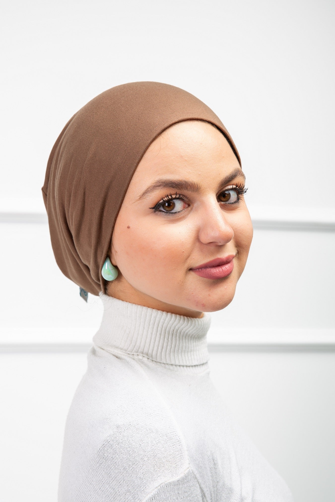 Nothread Bonnet from Velda Store, sleek stitch-free head covering with smooth finish