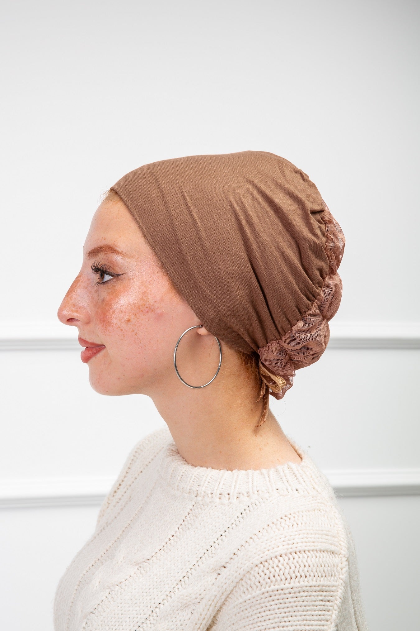 Bonnet with Tulle from Velda Store featuring soft fabric and elegant tulle detail