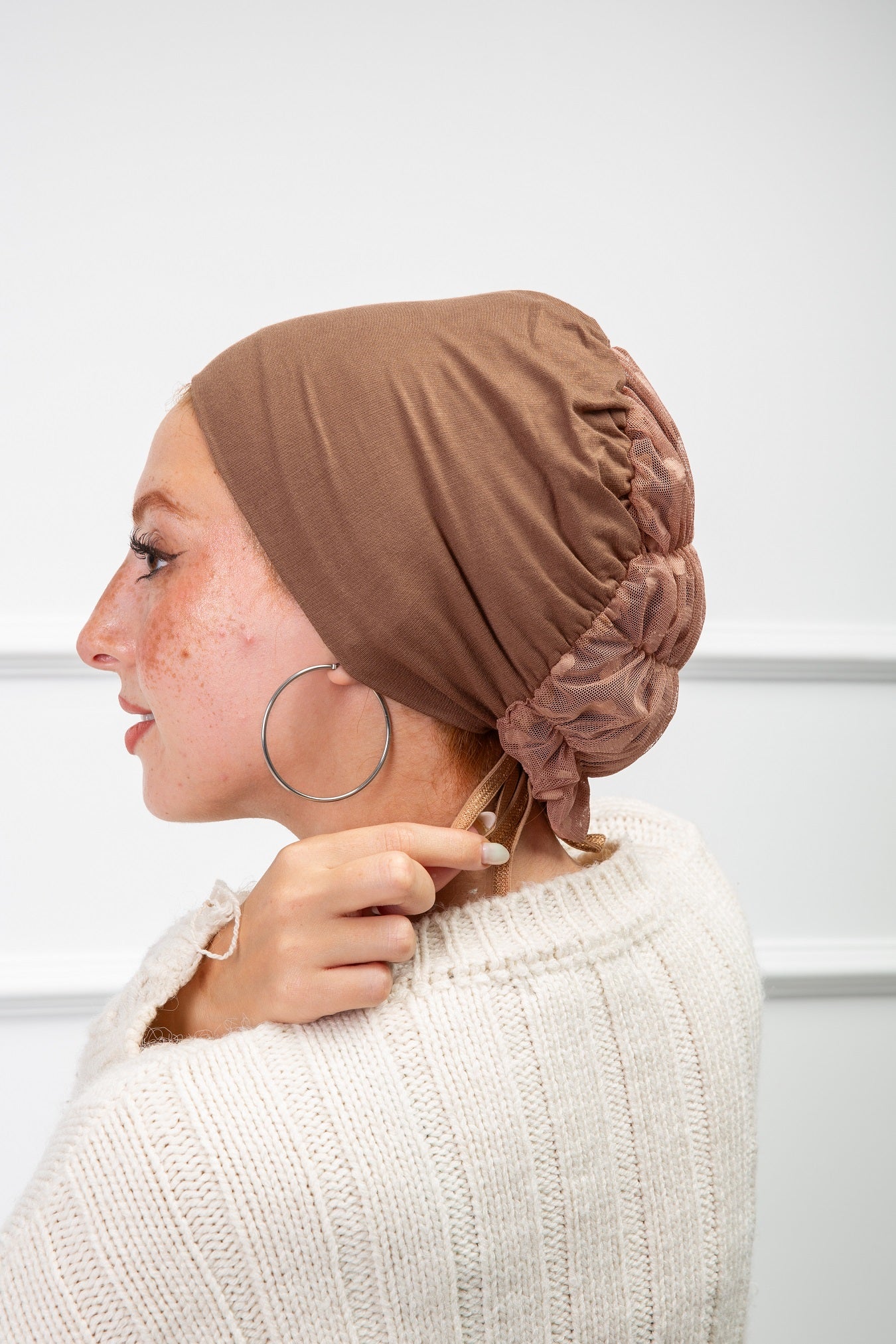 Bonnet with Tulle from Velda Store featuring soft fabric and elegant tulle detail