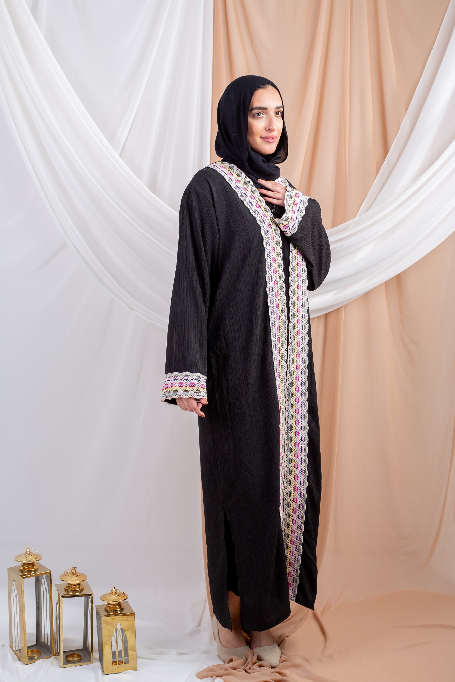 Marshmallow_Kaftan_Black 2 is a dreamy blend of comfort and style, crafted from airy Fresca fabric for a lightweight feel and a cloud-like touch that mirrors its name.