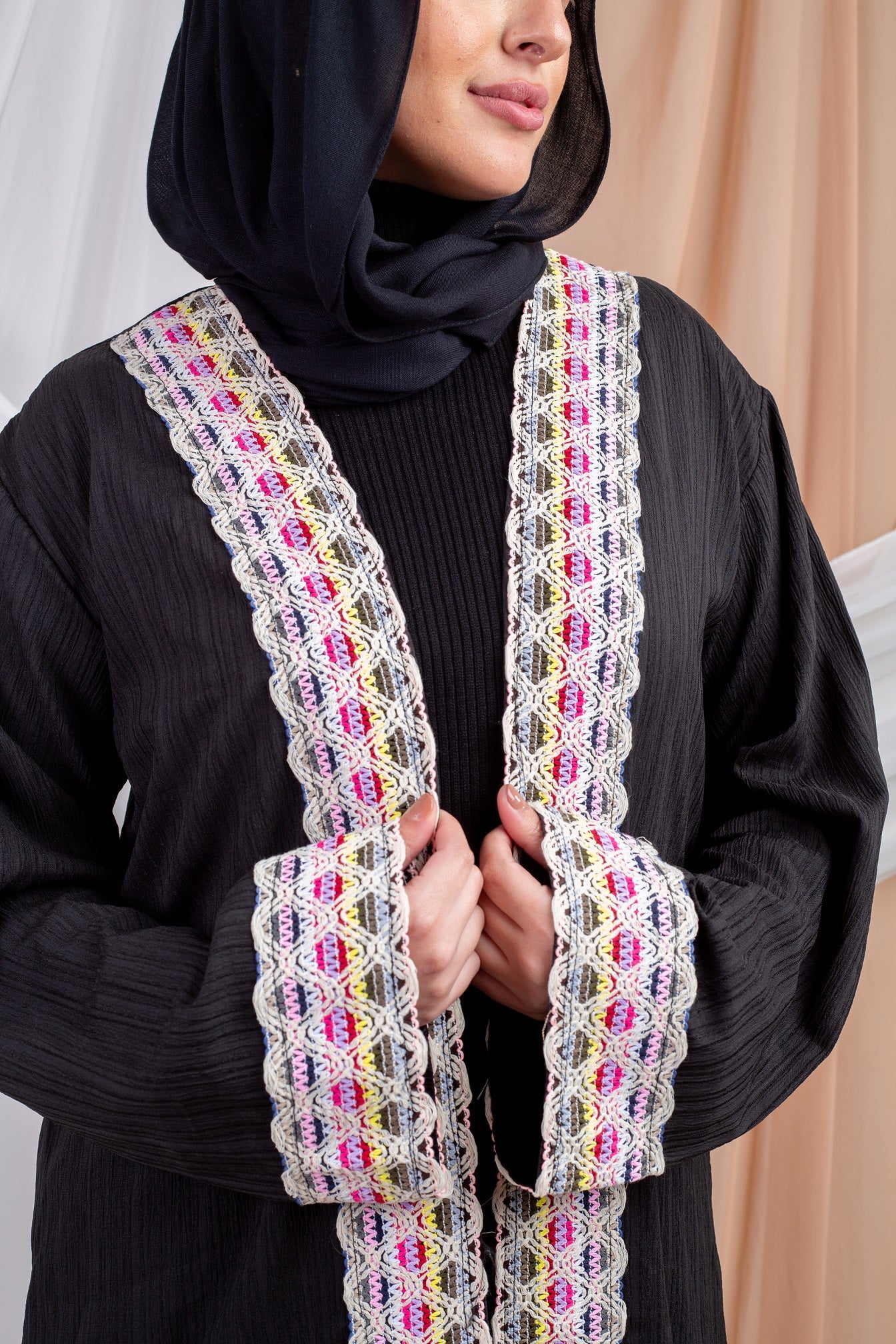 Marshmallow_Kaftan_Black 4 is a dreamy blend of comfort and style, crafted from airy Fresca fabric for a lightweight feel and a cloud-like touch that mirrors its name.