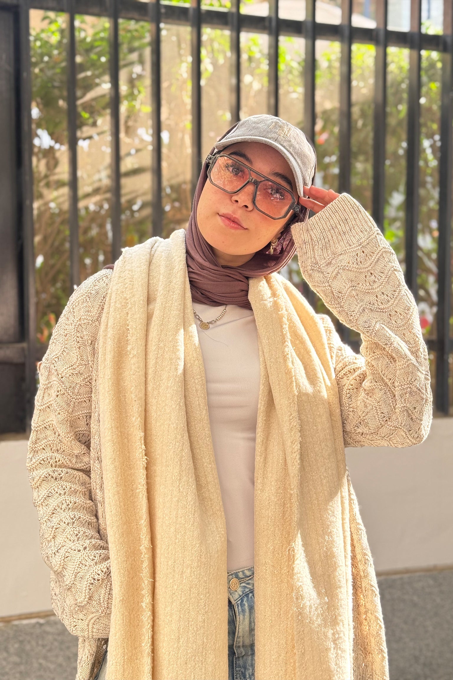 Stitchy Cardigan crafted from trico fabric, featuring long sleeves for a cozy and stylish look.