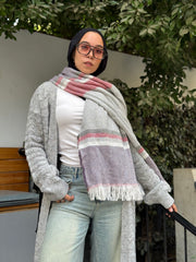 Stitchy Cardigan Gray crafted from trico fabric, featuring long sleeves for a cozy and stylish look.