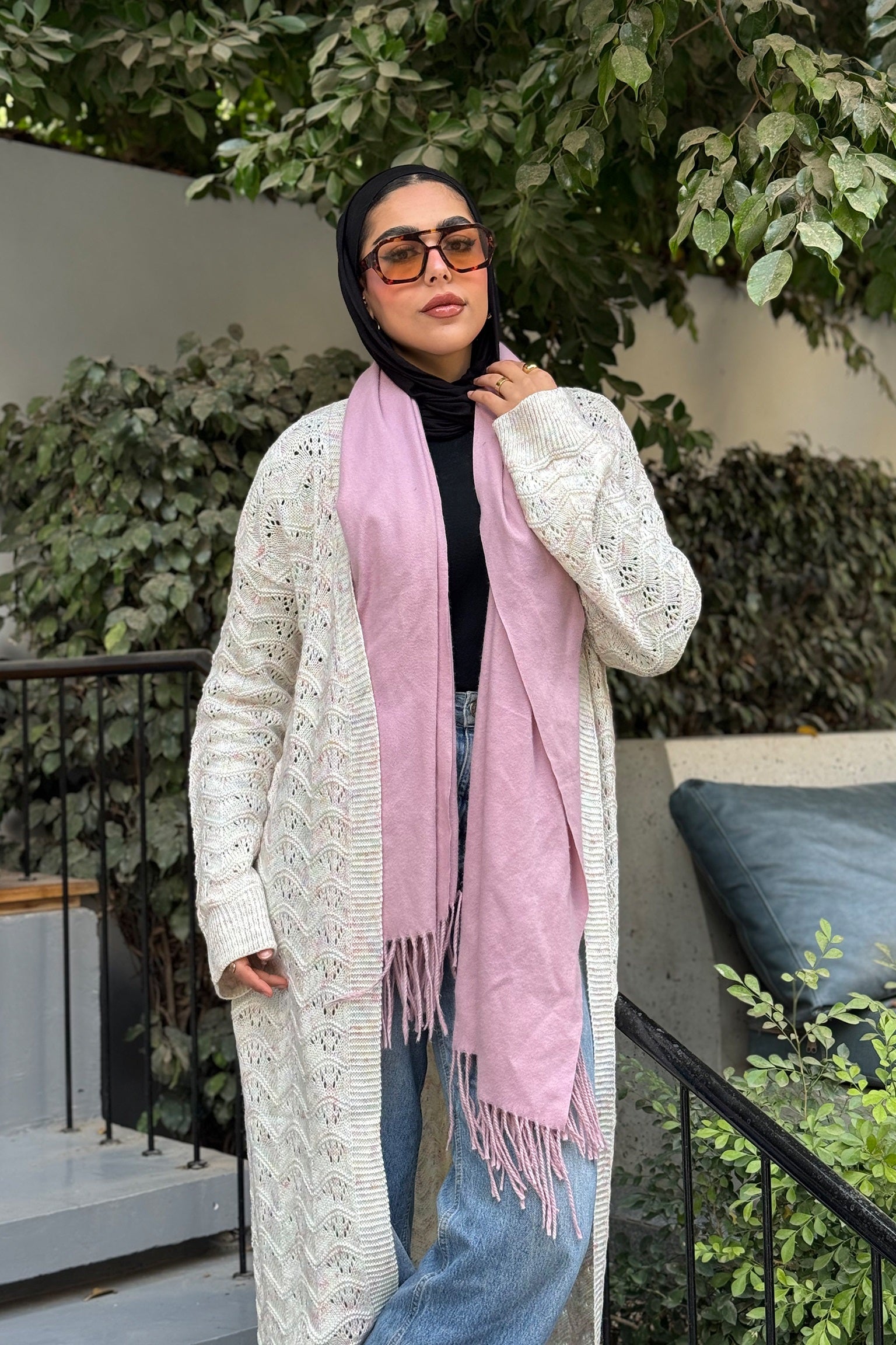 Stitchy Cardigan crafted from trico fabric, featuring long sleeves for a cozy and stylish look.