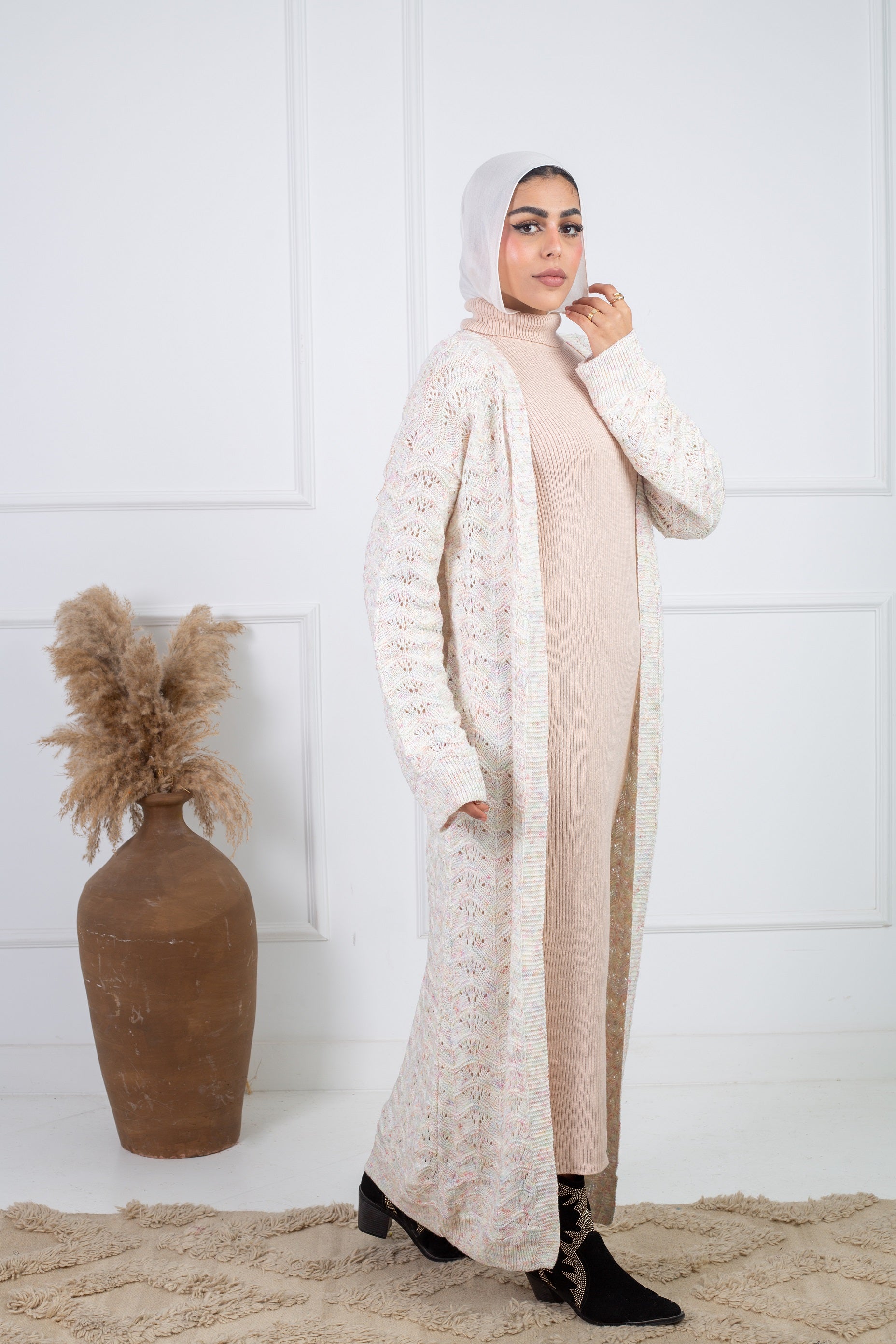 Stitchy Cardigan Off White crafted from trico fabric, featuring long sleeves for a cozy and stylish look.