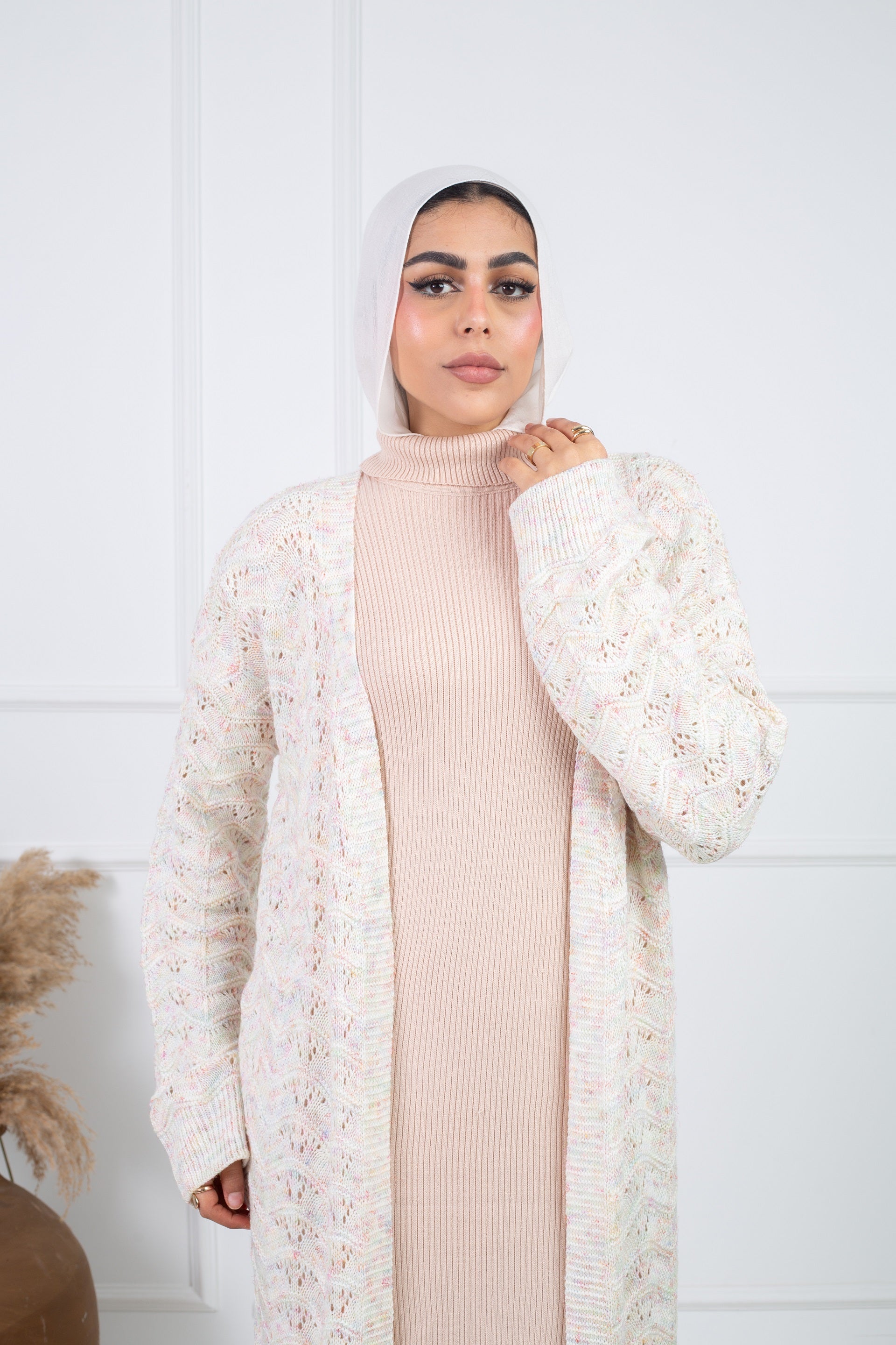 Stitchy Cardigan Off White crafted from trico fabric, featuring long sleeves for a cozy and stylish look.