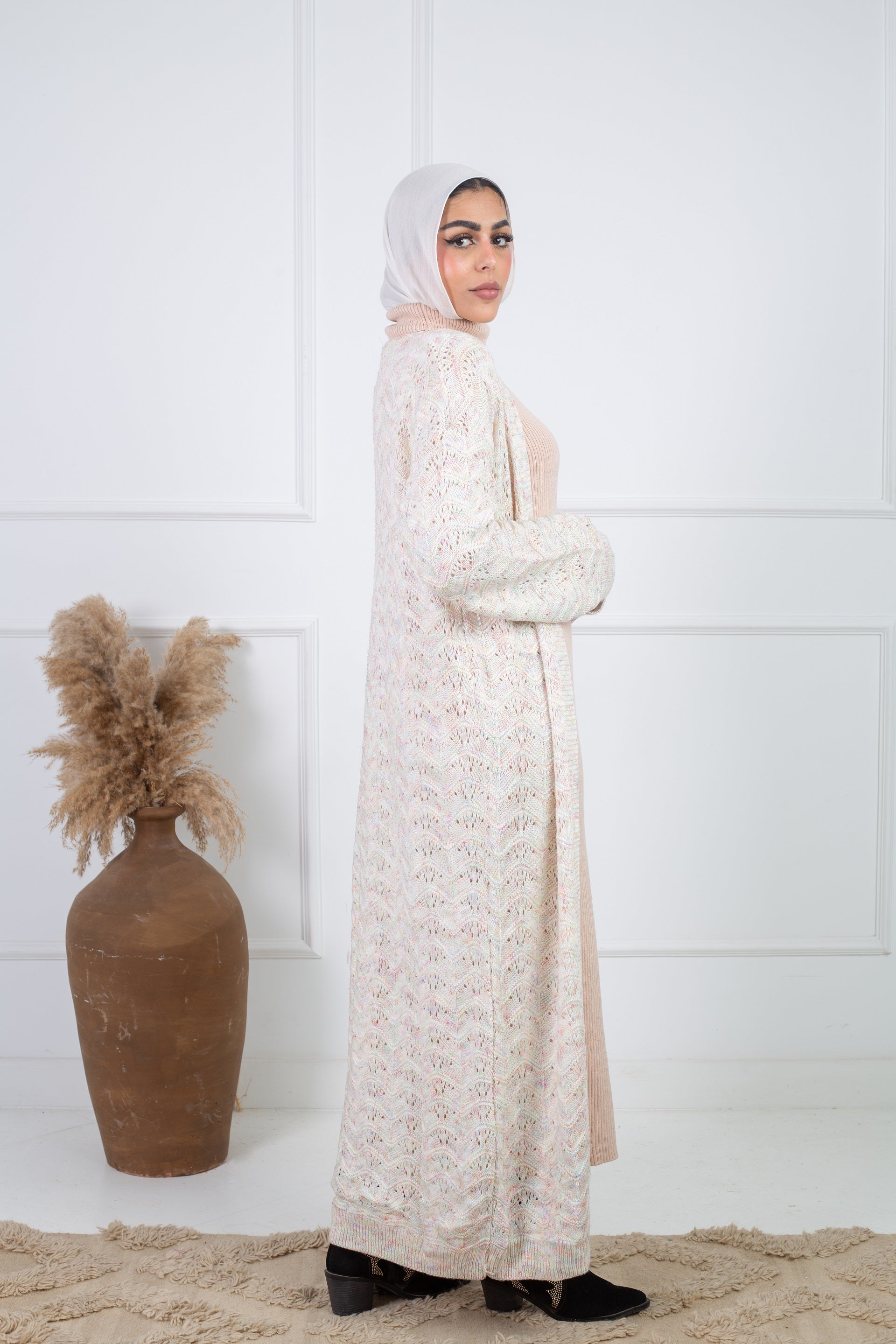 Stitchy Cardigan Off White crafted from trico fabric, featuring long sleeves for a cozy and stylish look.