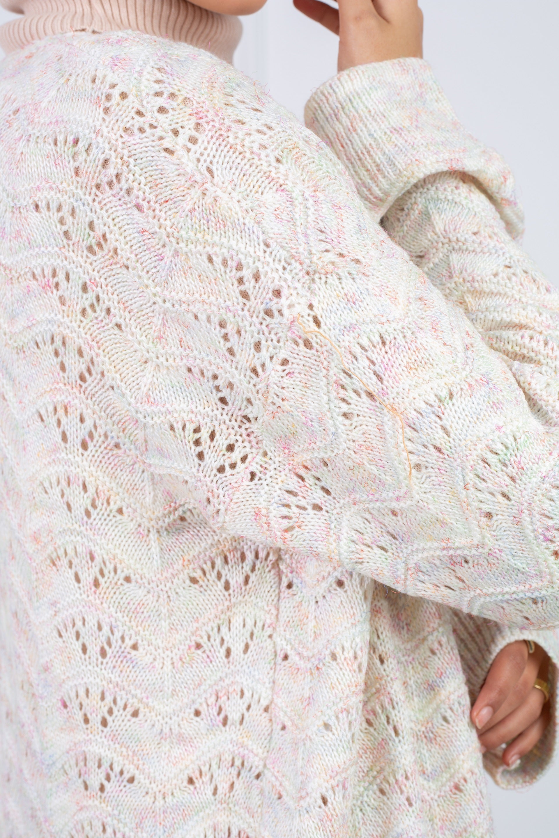 Stitchy Cardigan Off White crafted from trico fabric, featuring long sleeves for a cozy and stylish look.