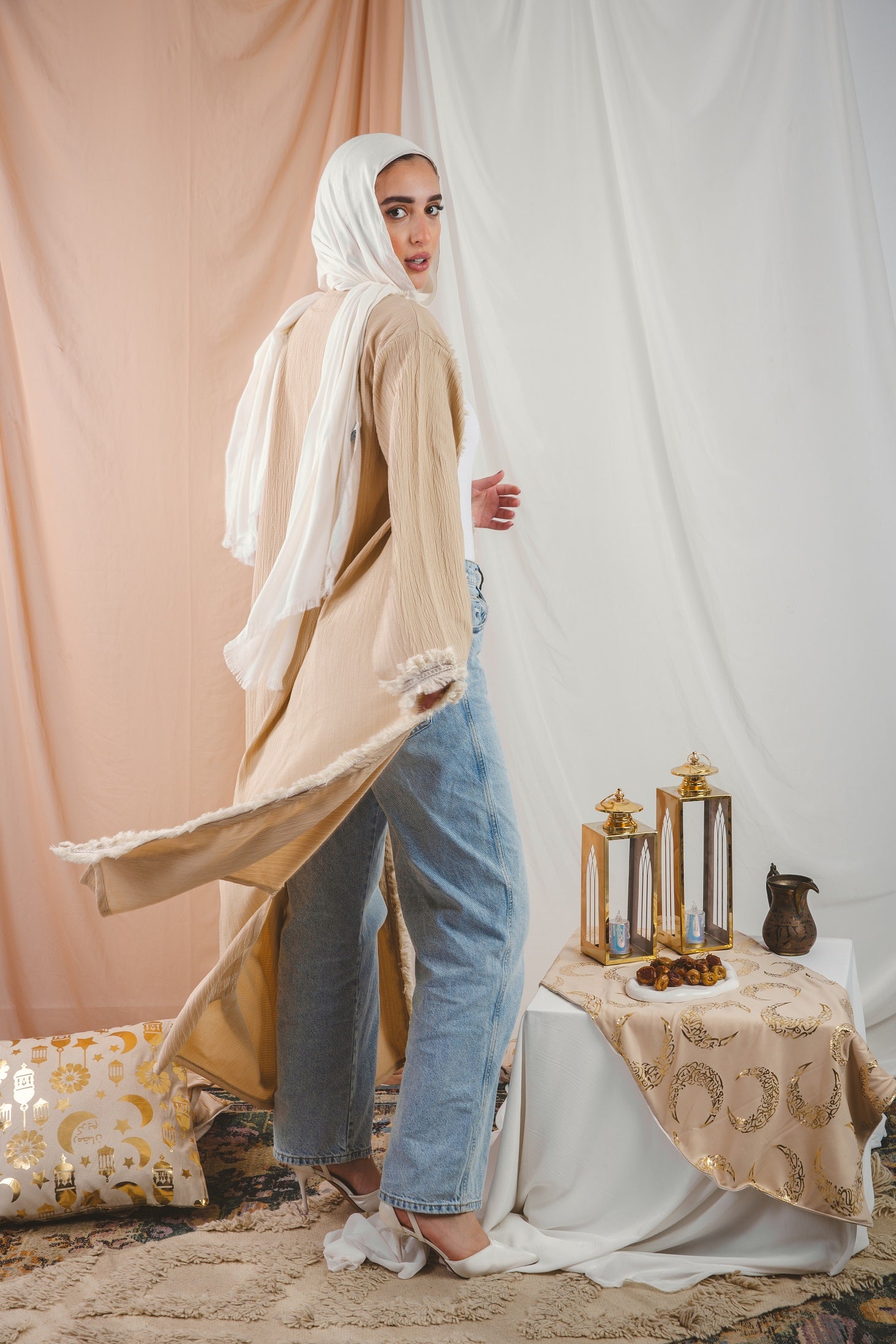 Zahra Kaftan beige crafted from Fresca fabric, features a unique design along the edges and sleeves, blending elegance with modern charm