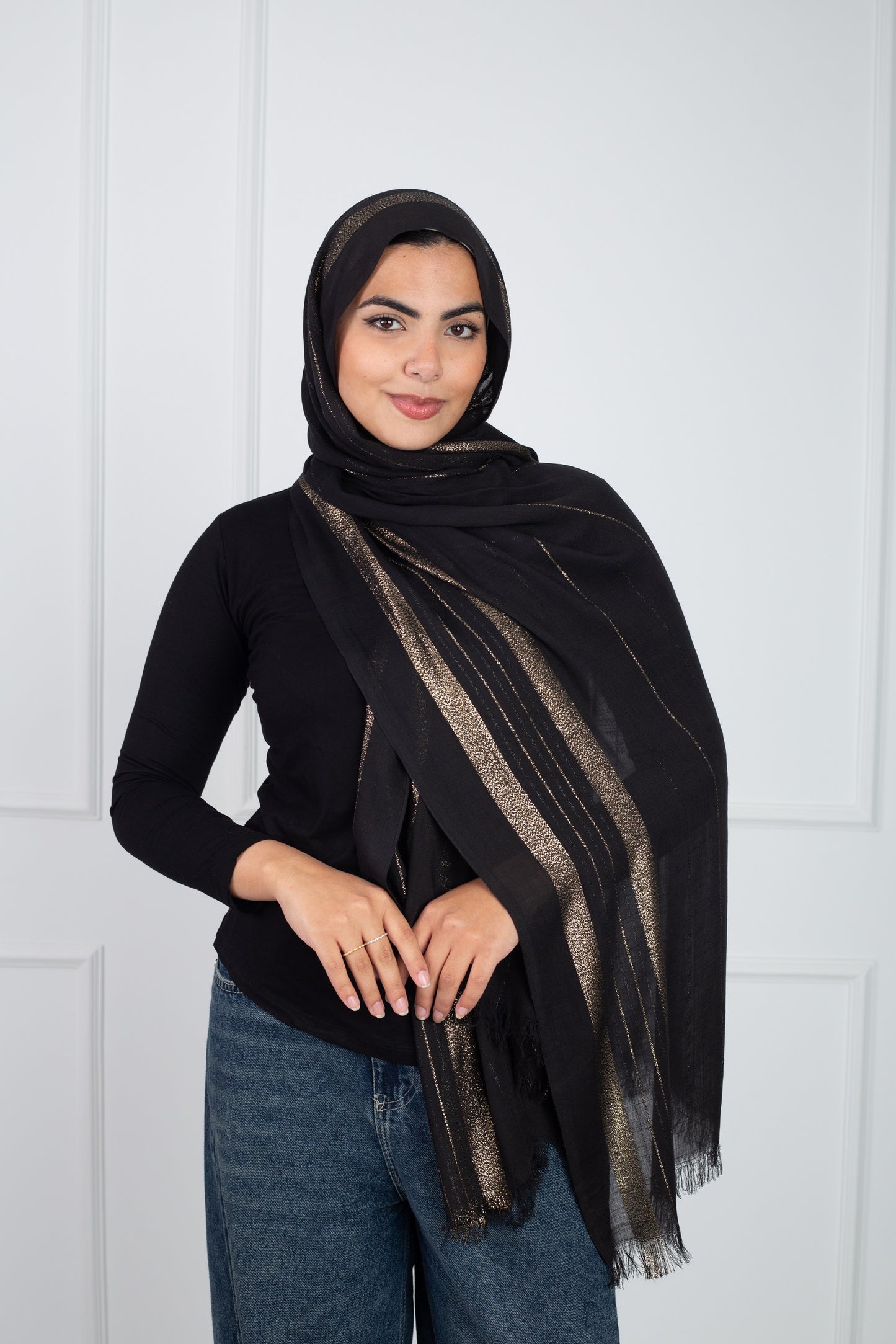 Glowy gold scarf with radiant metallic finish